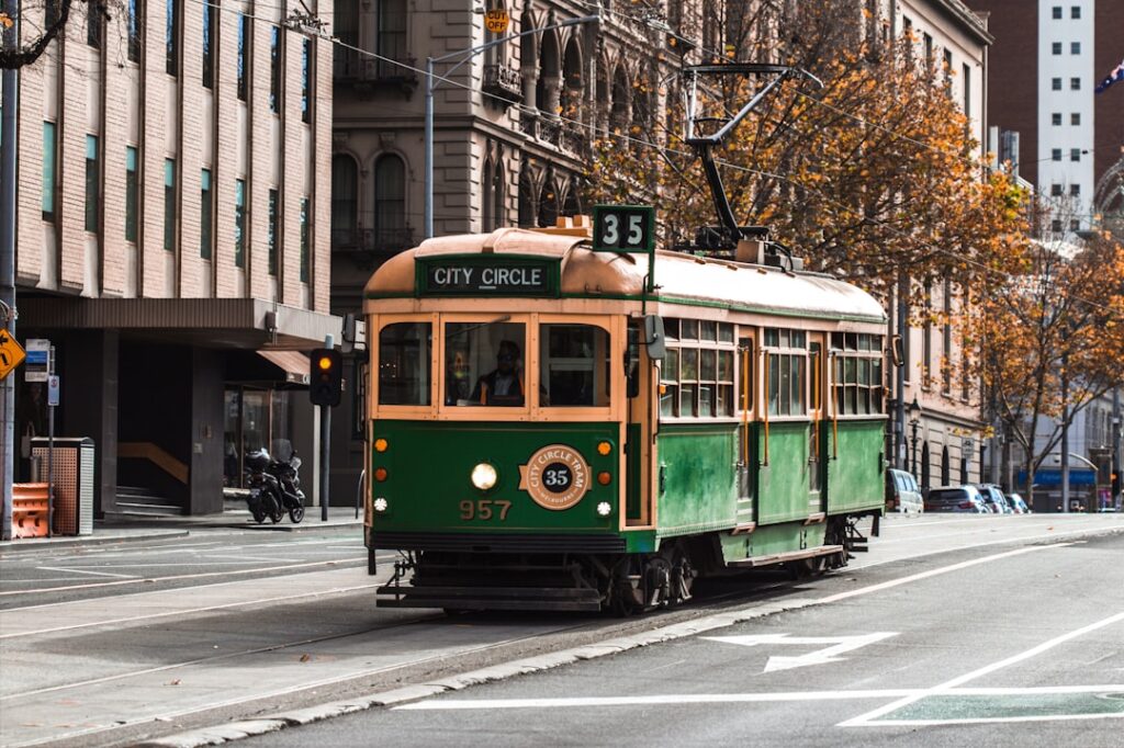 Classic green and yellow tram on a Melbourne street